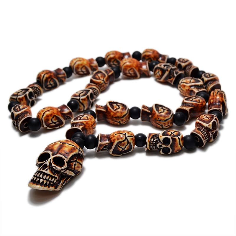 Gothic imitation bone necklace featuring a skull pendant, perfect for men and women at cosplay or rock events.