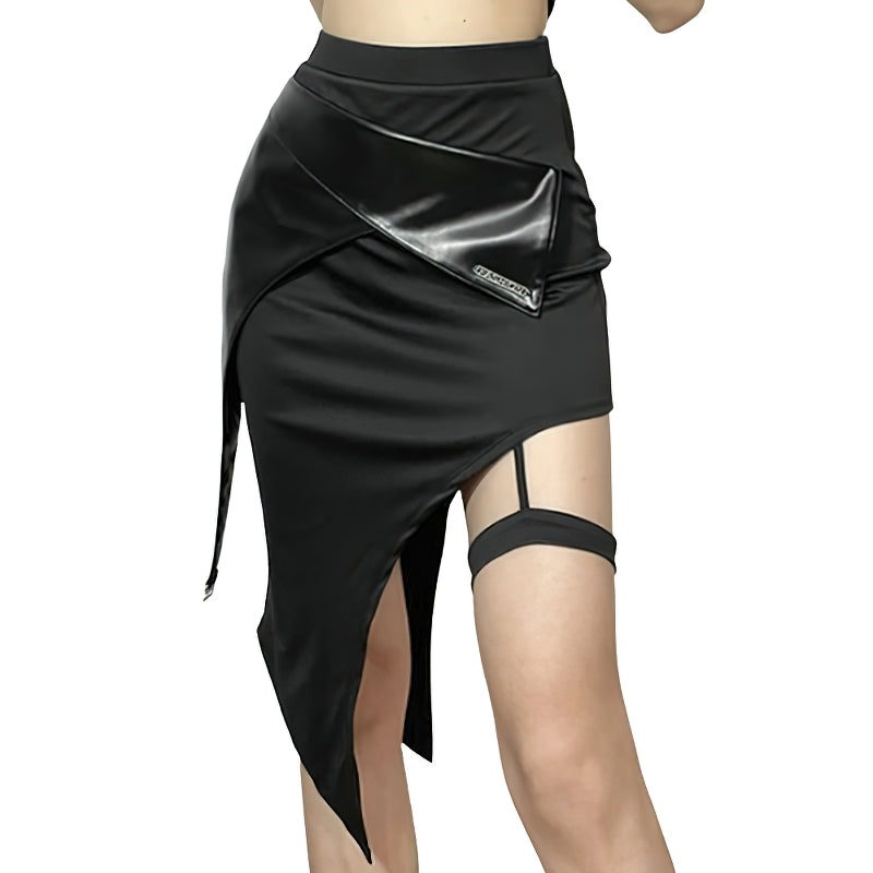 Stylish black patchwork mini skirt with irregular hem and grunge design for a gothic fashion statement.