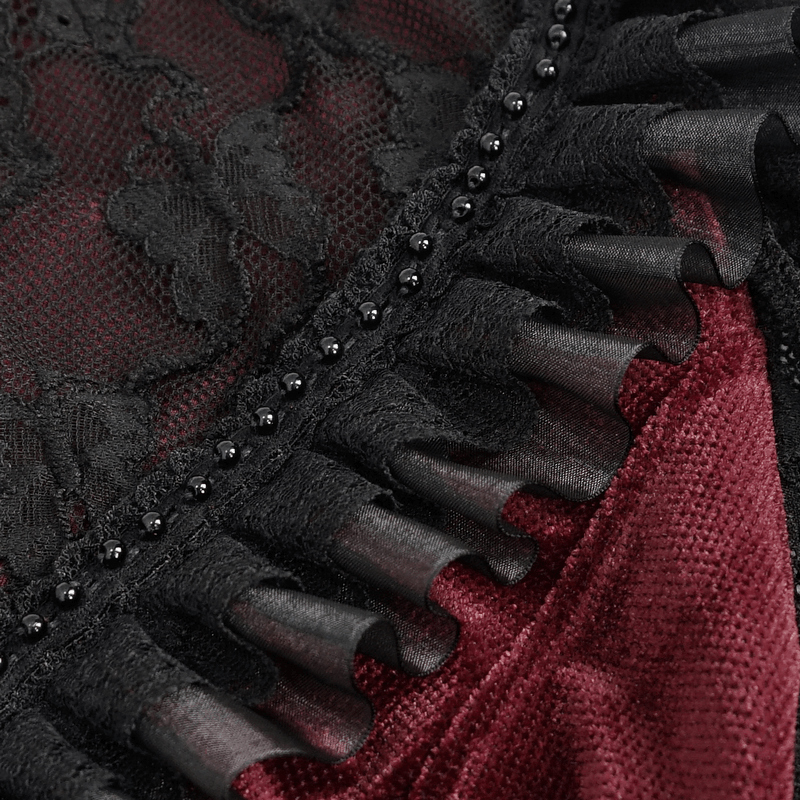Close-up of intricate black lace and red velvet detailing with ruffled edges for a gothic blouse.