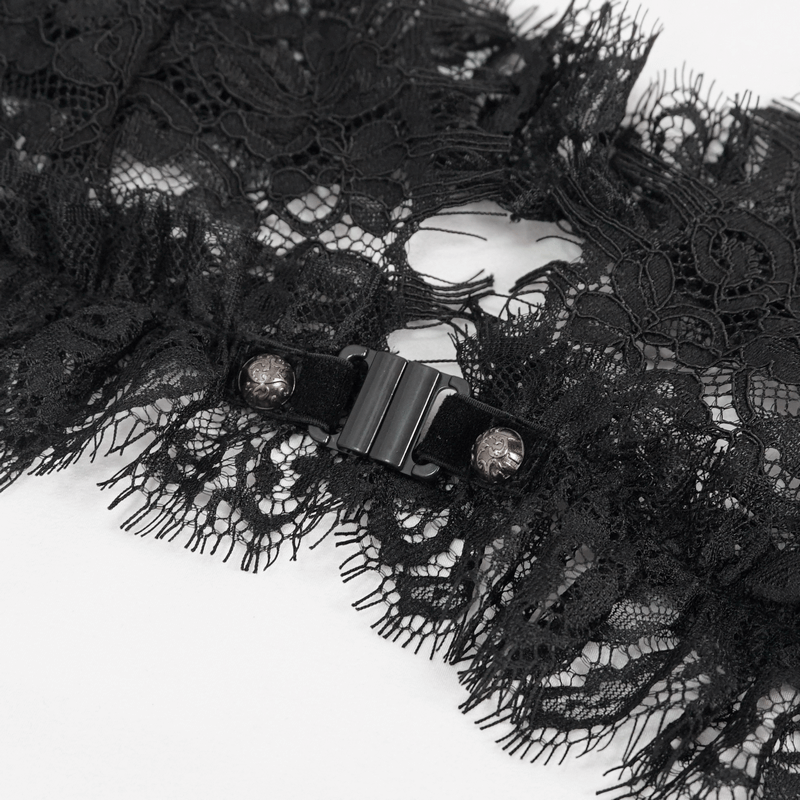 Close-up of elegant black lace lingerie set clasp detail, showcasing intricate gothic design and chic elegance.
