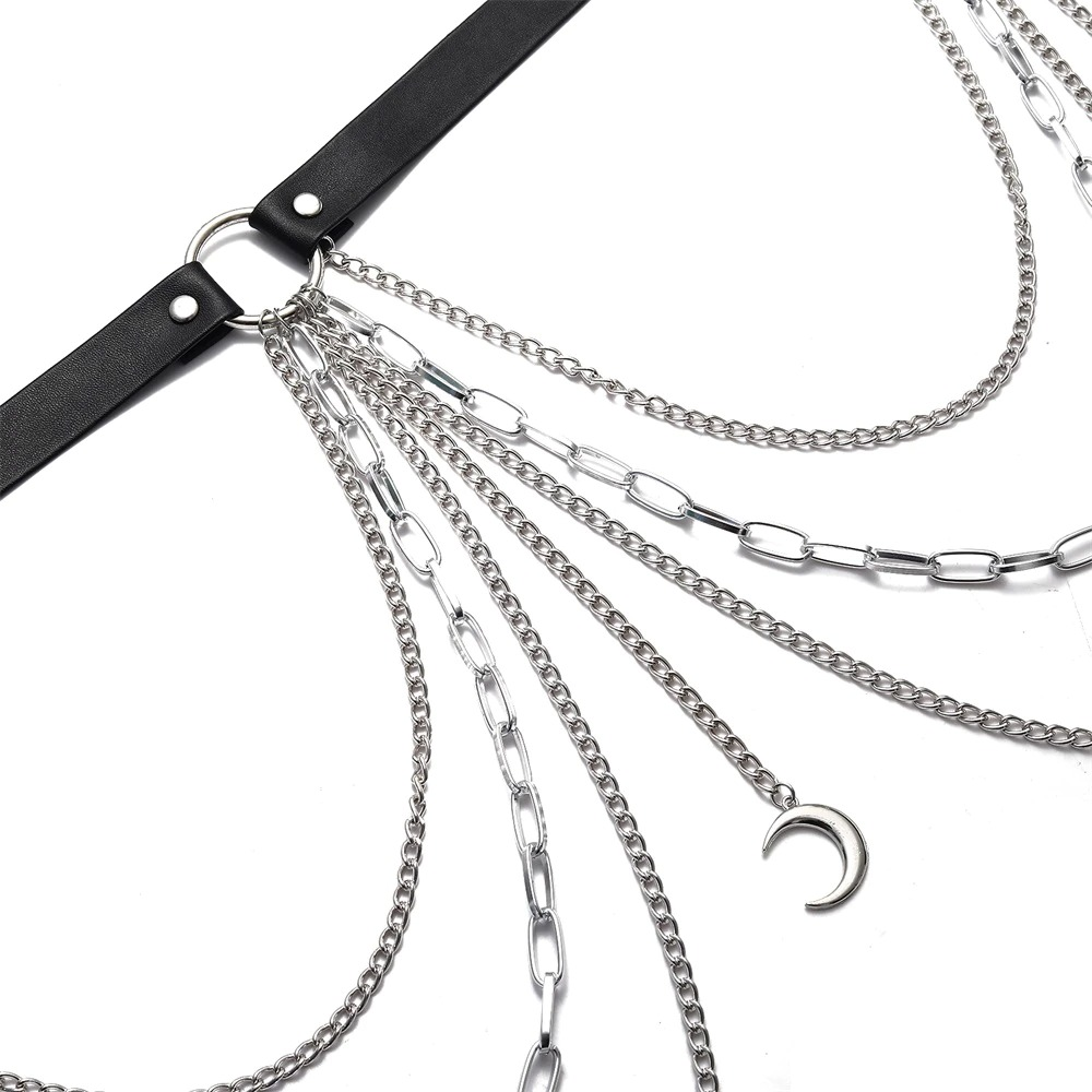 Gothic leather belt harness with silver chains and moon pendant for edgy fashion lovers.