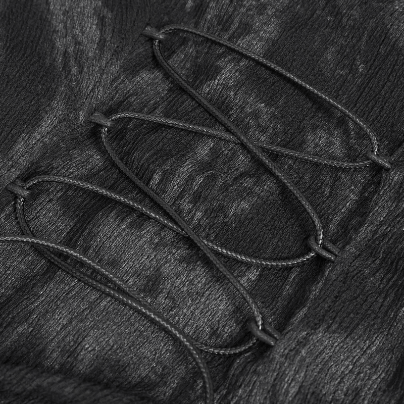 Close-up of lace-up detail on gothic black blouse, showcasing the edgy design and texture.