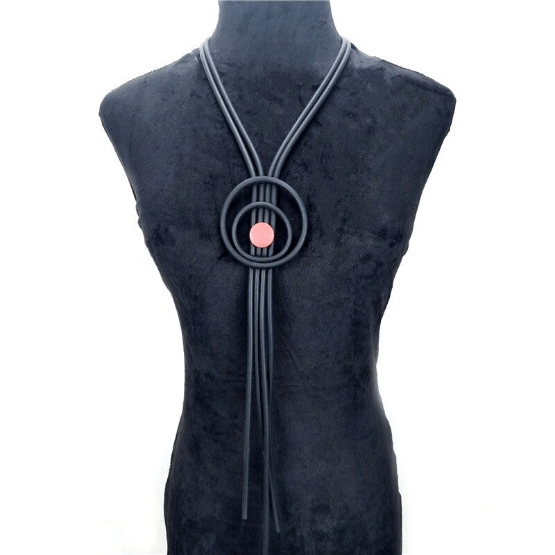 Gothic long tassel necklace for women, handmade rubber accessory with circular detail and stylish design.