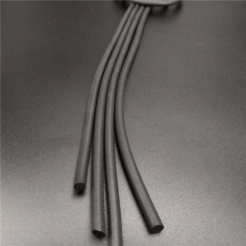 Close-up of black rubber tassels for a gothic long necklace, showcasing the handmade quality and stylish design.