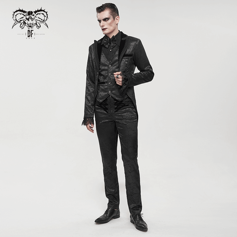 Gothic male model wearing a stylish black two-piece coat with vintage pattern and lace detailing.