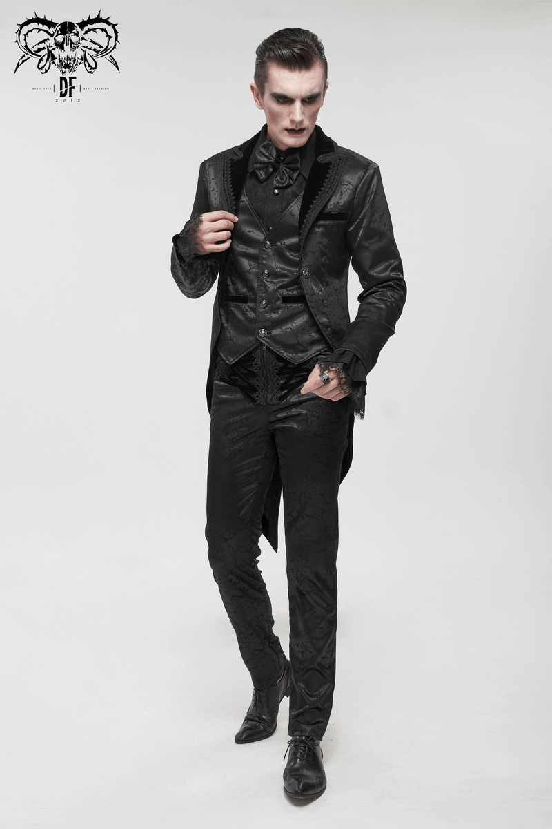 Gothic male model in a stylish black two-piece coat with vintage details and lace.