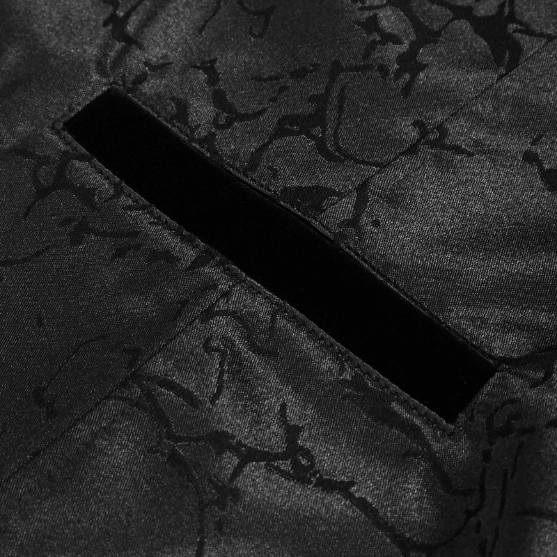 Close-up of the textured fabric of a gothic male slim coat with a stylish black pocket detail.