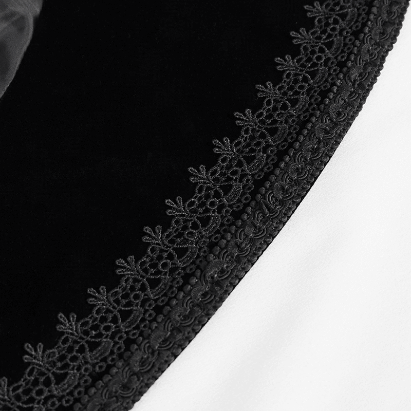 Close-up of elegant black lace trim on a gothic coat, showcasing intricate detailing and vintage design.