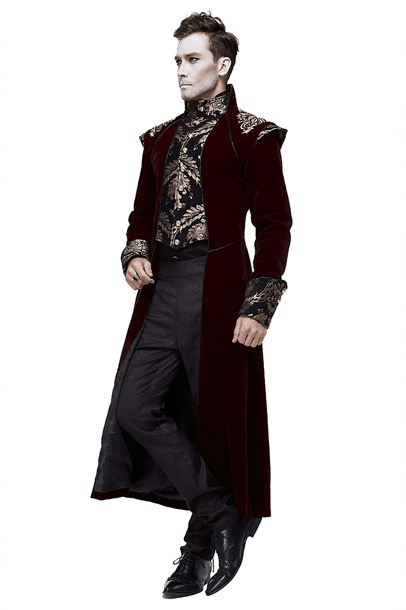 Stylish male model wearing a vintage gothic wine red long tail coat with gold patterns, showcasing elegance and retro fashion.