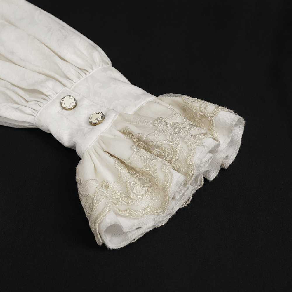 Close-up of lace frill and metal buttons on a gothic vintage white shirt for men.