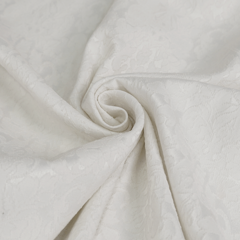 Elegant white vintage fabric with intricate floral pattern, ideal for gothic shirts and stylish clothing.