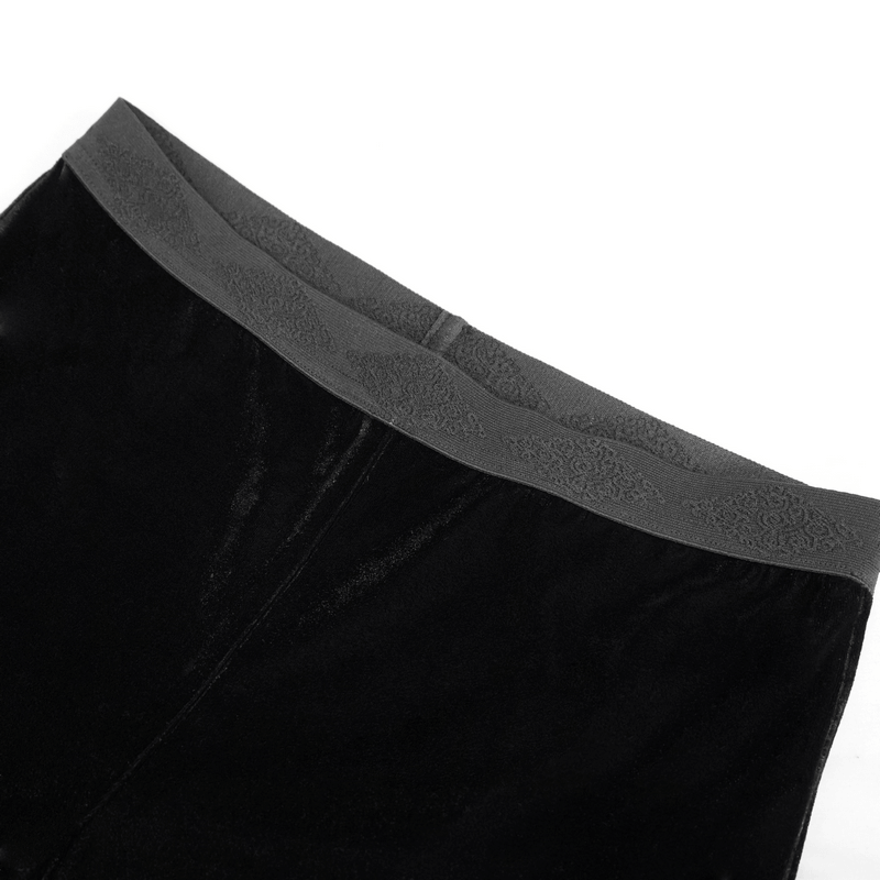 Close-up of gothic mesh flared trousers featuring a stylish gray lace waistband.