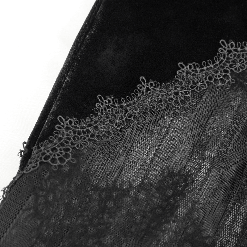 Close-up of black lace trim on gothic mesh fabric, showcasing intricate design for flared trousers.