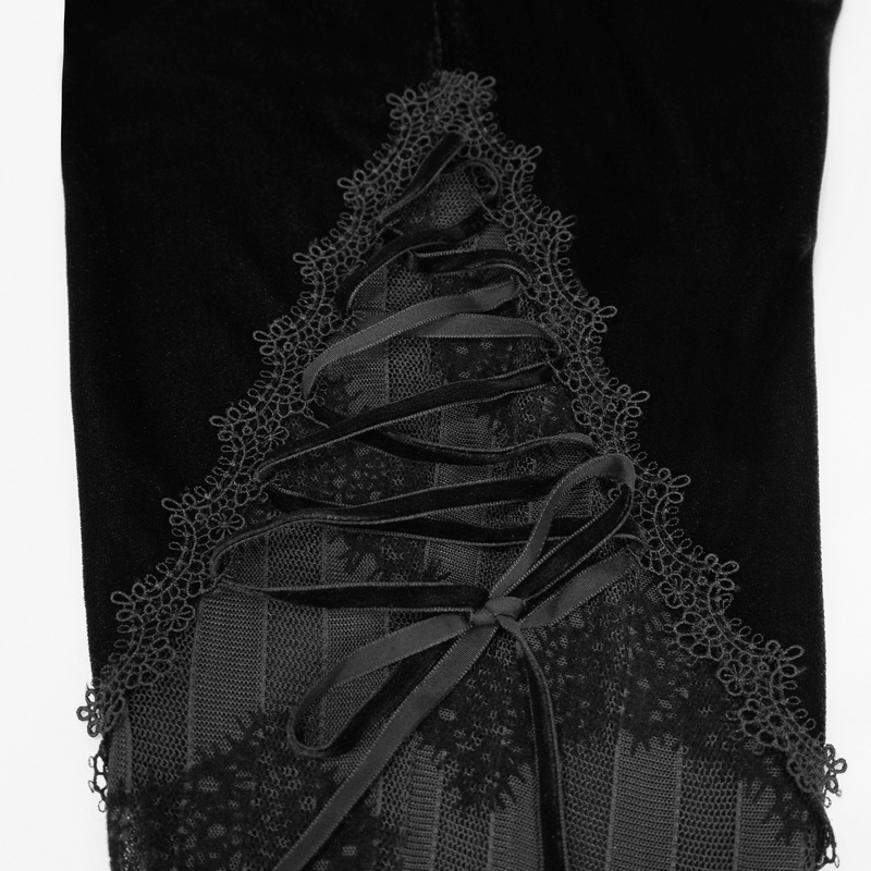 Close-up of gothic mesh flared trousers featuring intricate lace inserts and elegant side ties.