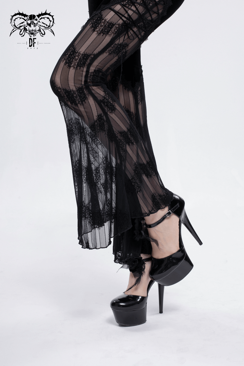 Close-up of gothic mesh flared trousers with lace detailing, paired with stylish black high heels.