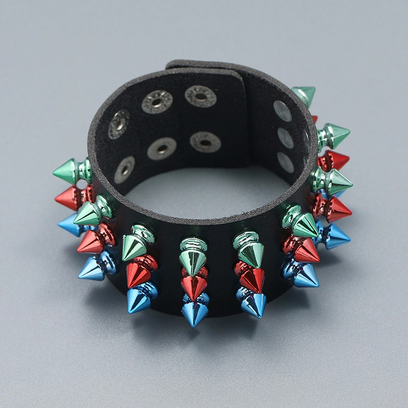 Multicolor spike rivet bracelet in punk style with wide PU leather cuff, perfect for bold outfits.