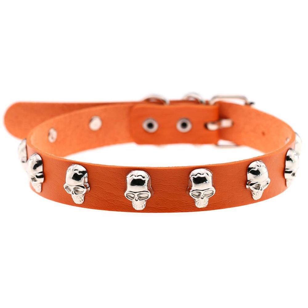 Gothic leather choker with zinc alloy skulls, perfect for alternative fashion and edgy outfits.