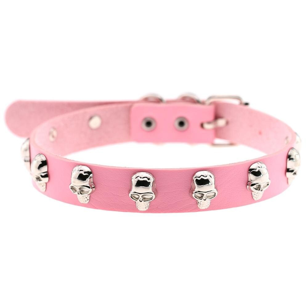 Gothic pink leather choker with zinc alloy skull embellishments for alternative fashion.