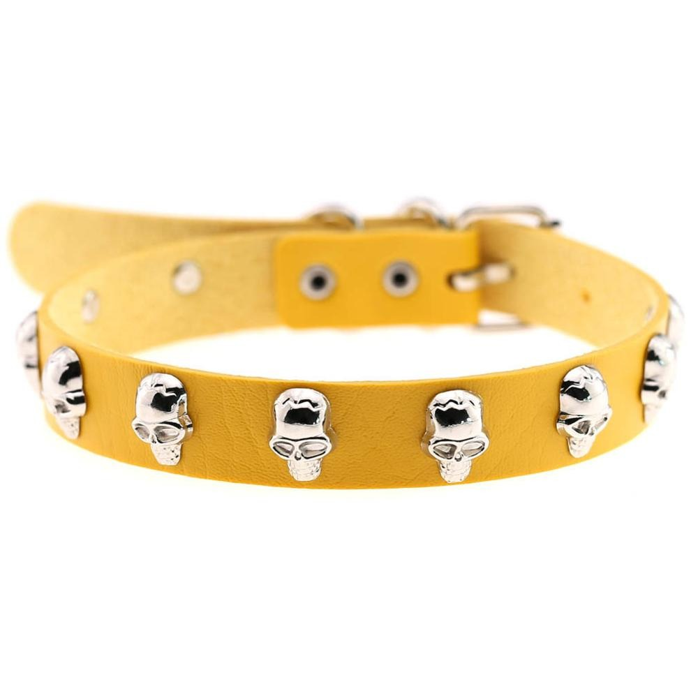 Gothic yellow leather choker with zinc alloy skull studs for alternative fashion.