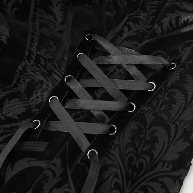 Close-up of a gothic off-shoulder dress with intricate lace-up details and elegant black fabric pattern.