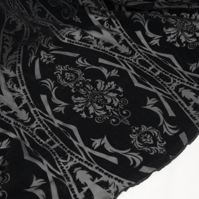 Close-up of gothic semi-transparent fabric with elegant black and grey floral patterns, perfect for a ruffled dress.