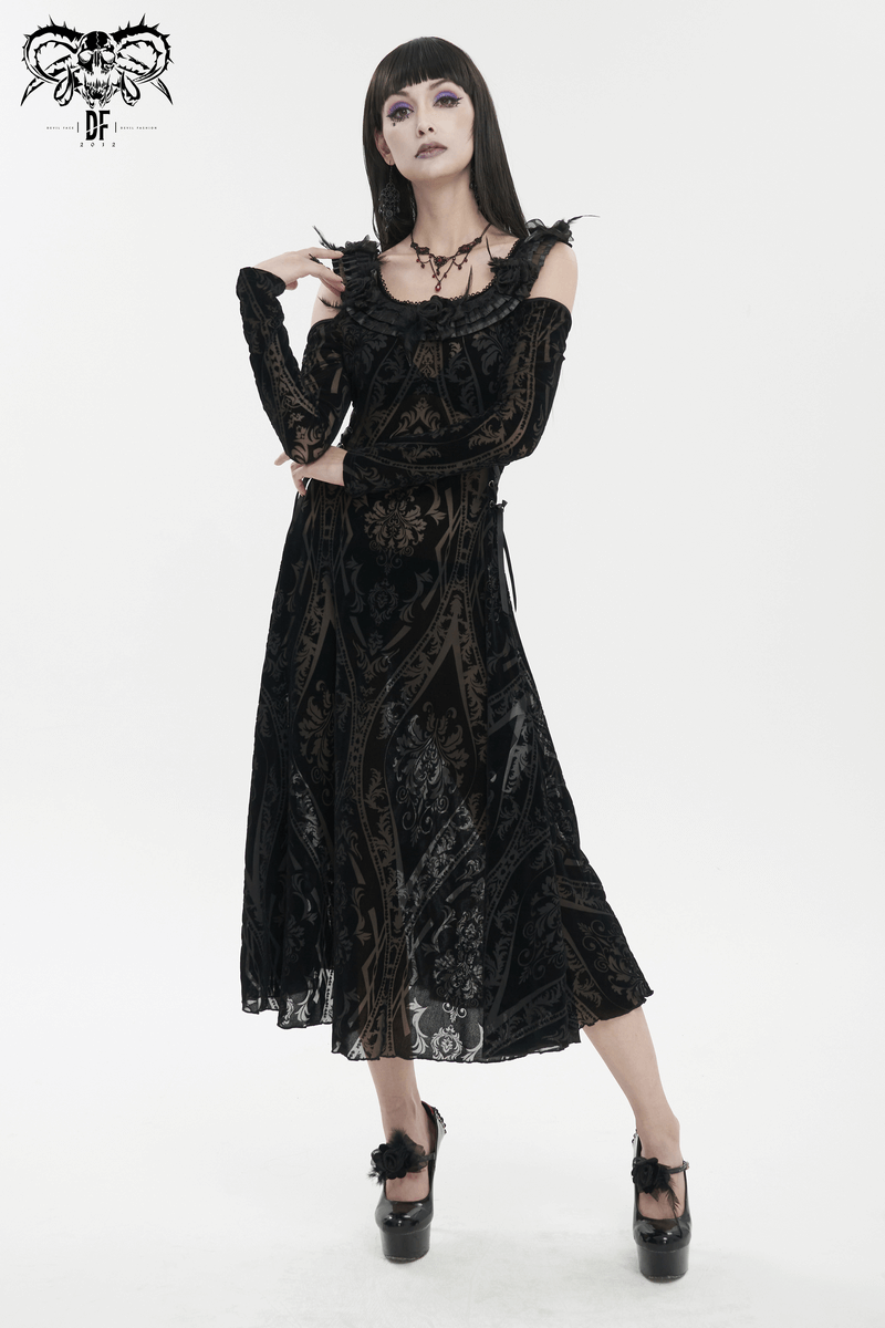 Black ruffled off-shoulder semi-transparent gothic dress on model, showcasing a striking pattern and elegant silhouette.