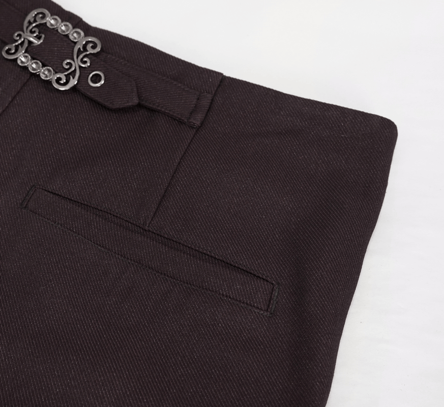 Close-up of gothic pants with stylish buckle detail and pockets, perfect for a bold fashion statement.