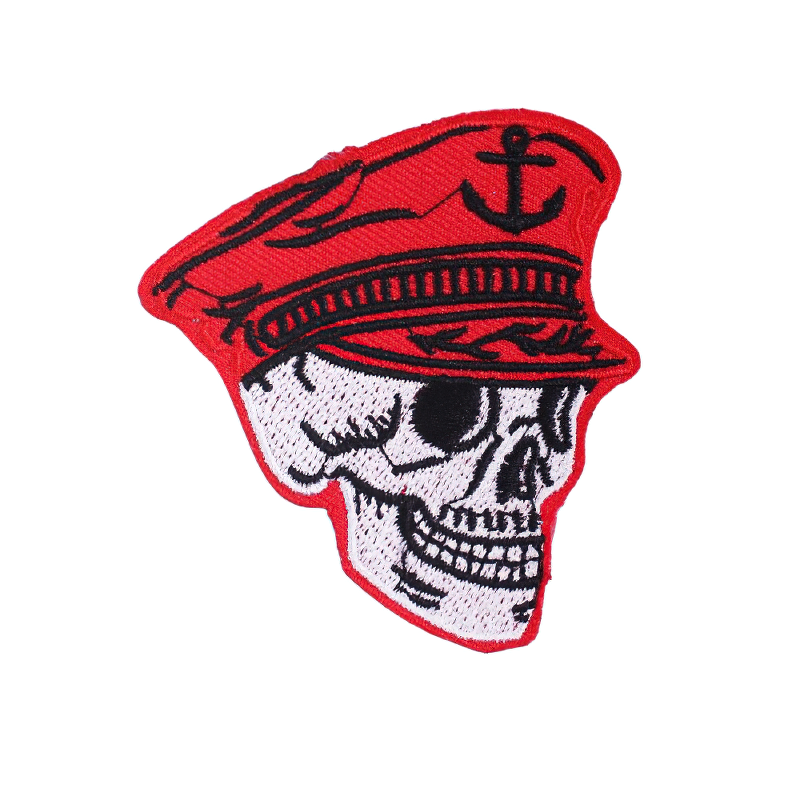 Gothic skull patch in captain sailor hat, stylish embroidered accessory for unisex clothing.