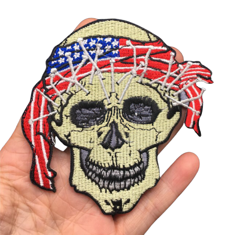 Gothic skull patch with USA flag design, perfect for alternative fashion outfits and accessories.