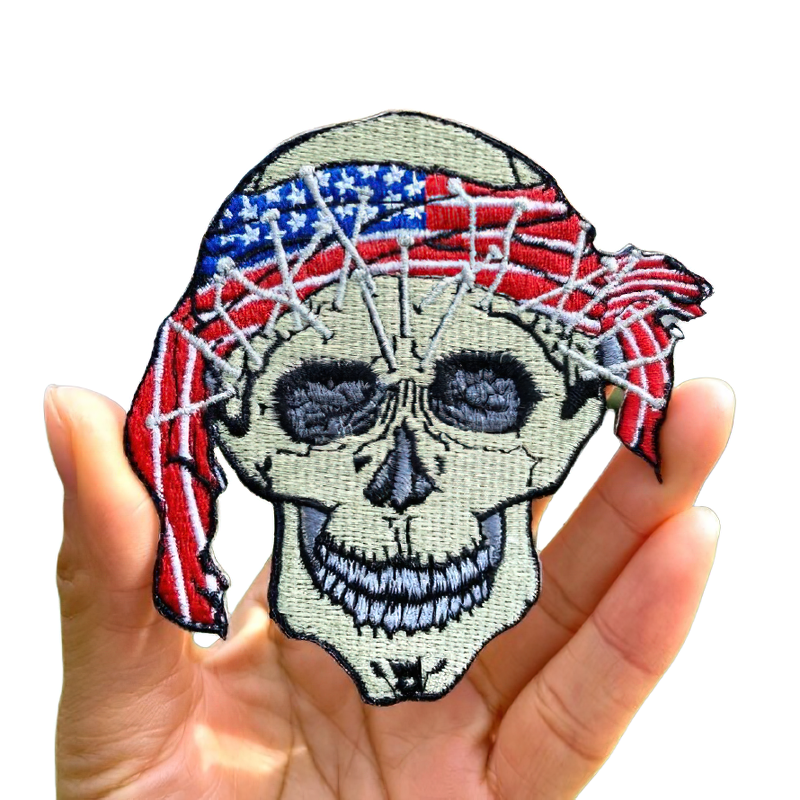 Gothic skull patch with American flag bandana, perfect for alternative fashion and clothing accessories.