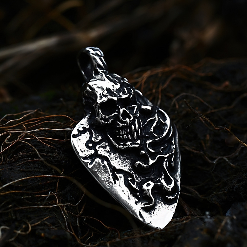 Unisex Gothic stainless steel skull pendant on dark background, perfect for rock style outfits.