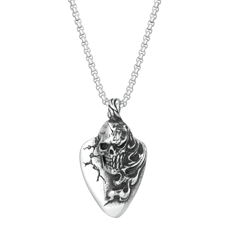 Unisex stainless steel skull pendant necklace in a rock style, perfect for trendy outfits.