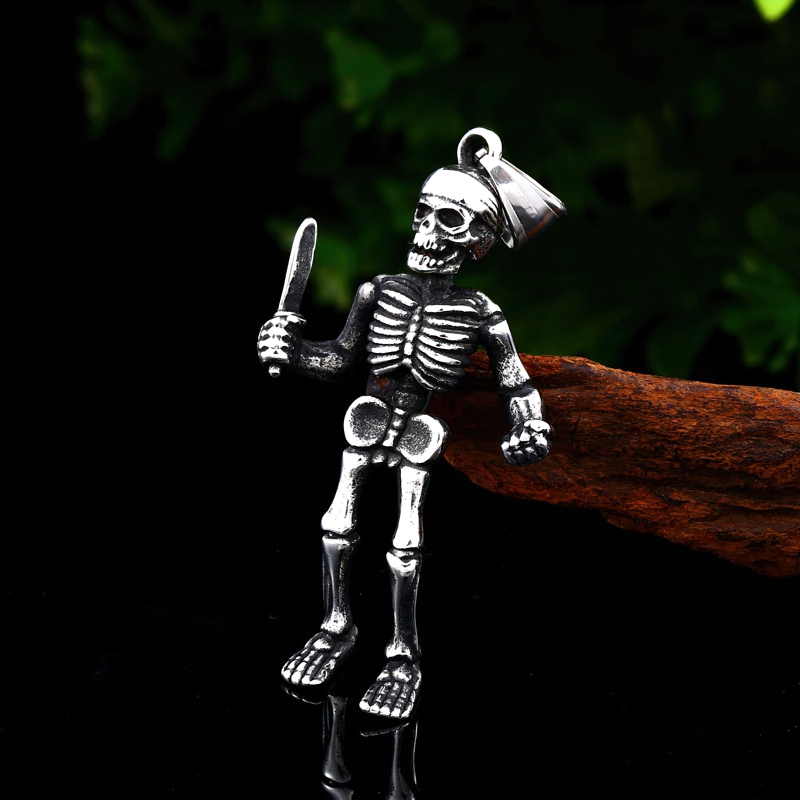 Stylish gothic skeleton pendant in stainless steel holding a knife, perfect for unisex alternative fashion.