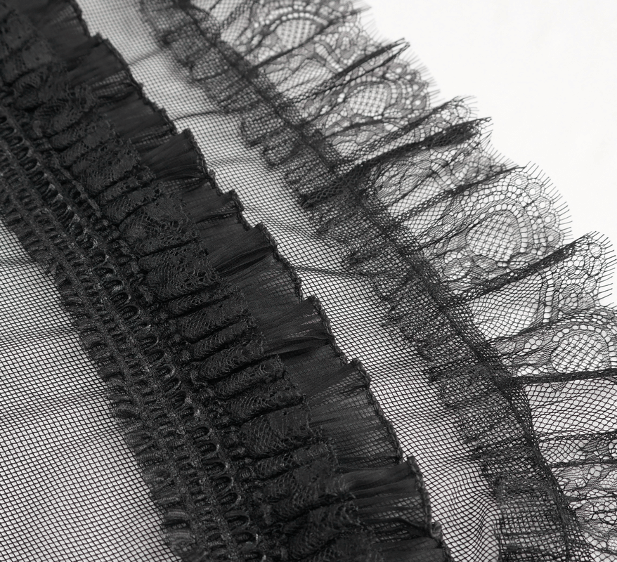 Elegant black lace trim showcasing ruffled detail, perfect for gothic fashion and dress embellishments.