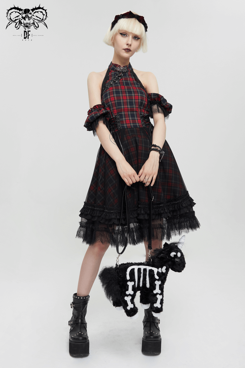 Gothic plaid dress with ruffled lace hemline, featuring detachable sleeves and a stylish black handbag.