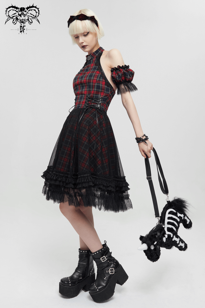 Gothic plaid dress with ruffled lace hemline and detachable sleeves, styled with a playful creature plush.