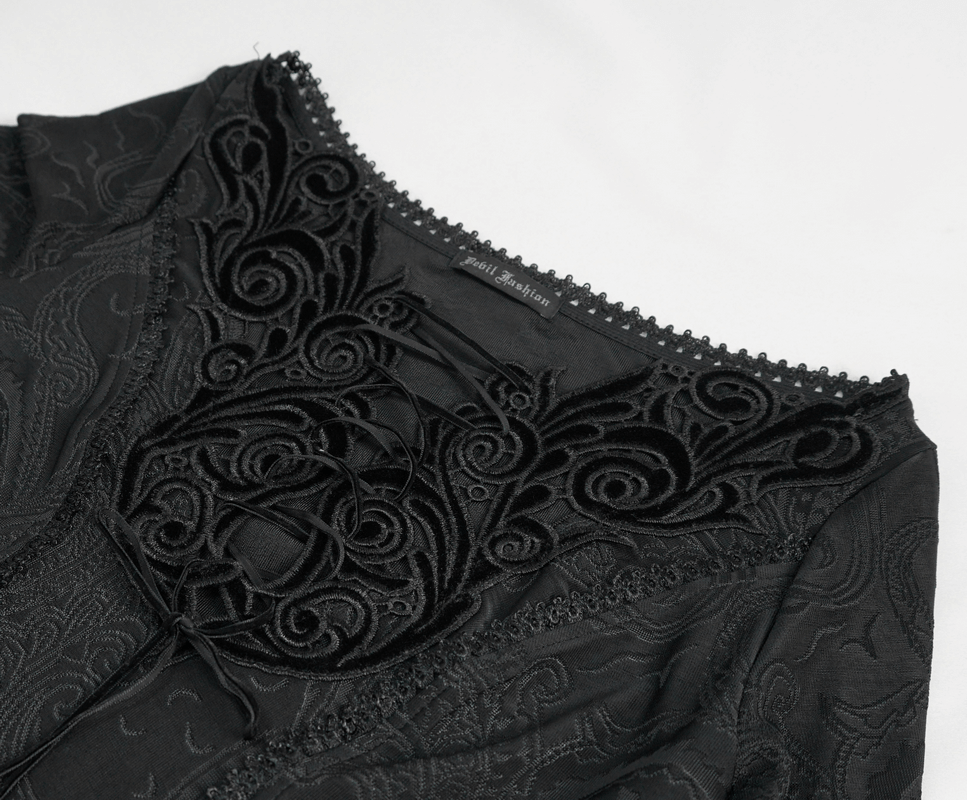 Elaborate floral embroidery neckline detail on a gothic black dress, showcasing intricate design and gothic elegance.