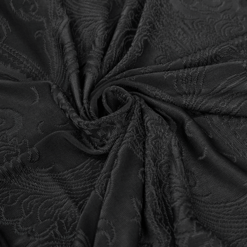 Close-up of soft black floral embossed fabric perfect for gothic fashion dresses.