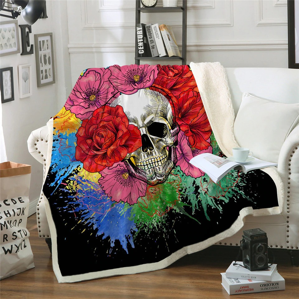 Gothic plush blanket featuring a colorful skull print with flowers, perfect for cozy home decor and gifts.