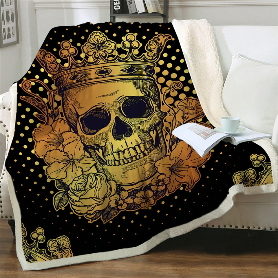 Gothic plush blanket featuring a golden skull crowned with flowers, perfect for cozy decor on chilly evenings.