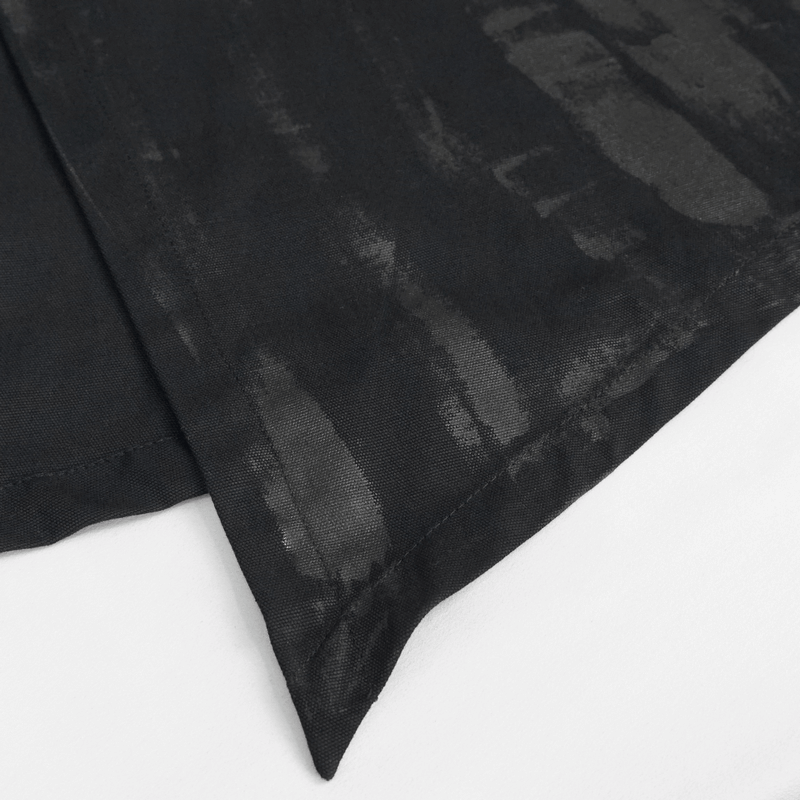 Close-up of a black fabric with a subtle textured pattern, showcasing the quality of the material.