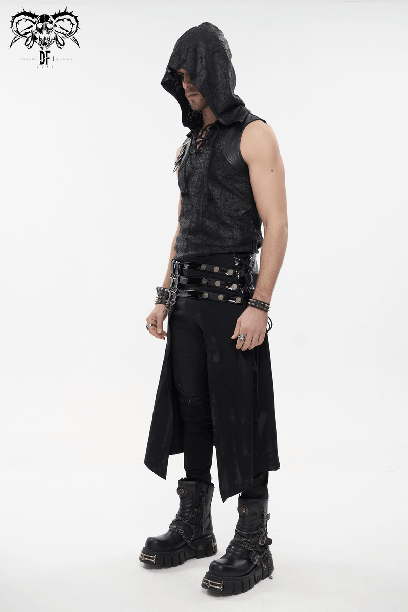 Stylish man in gothic PU leather kilt with rivets, boots, and hooded vest, embodying punk rock fashion.