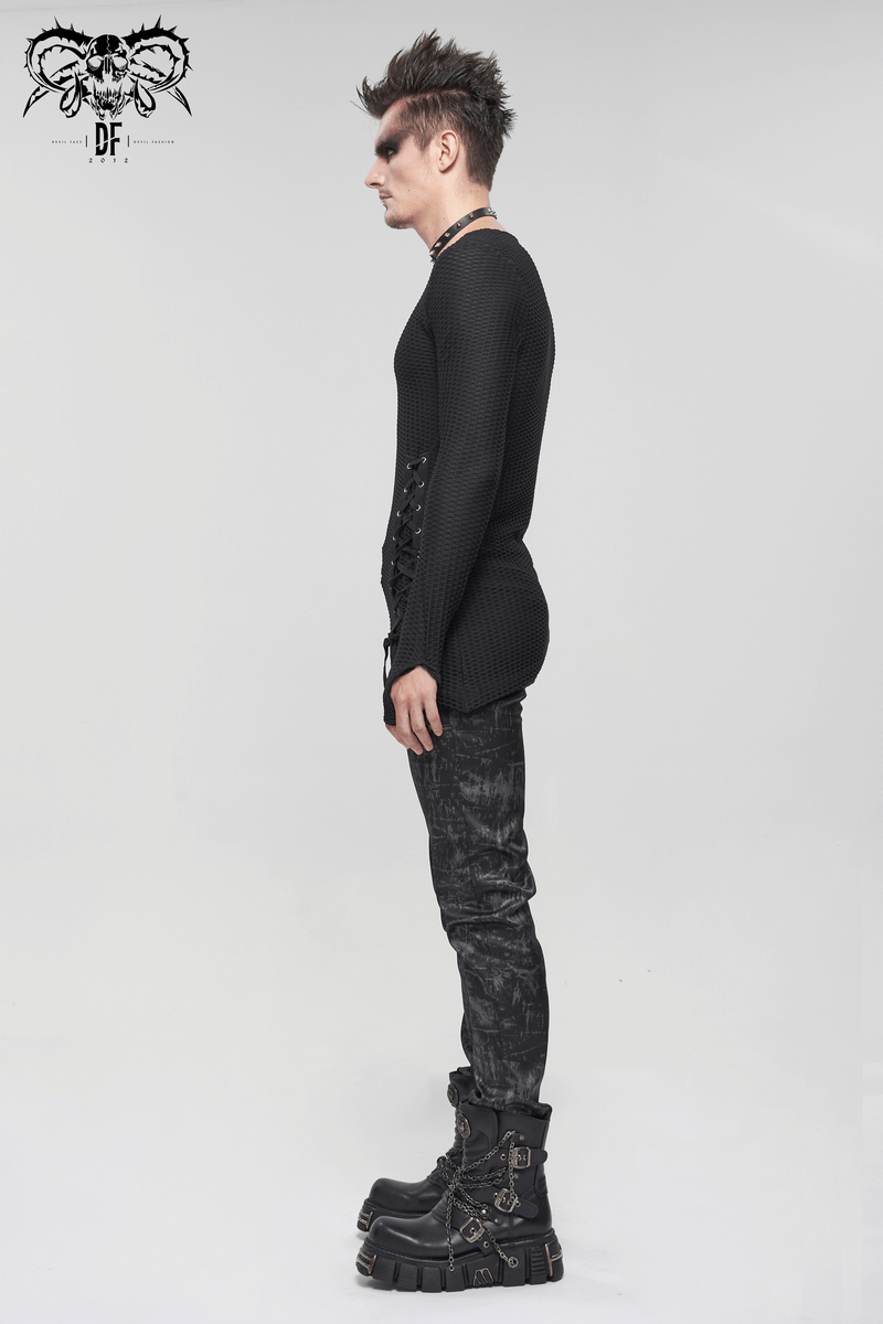 Men's Gothic punk asymmetric black sweatshirt with lace-up, paired with stylish black pants and chunky boots.