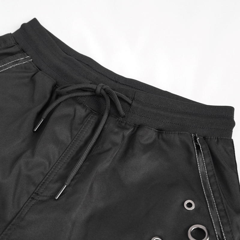 Close-up of gothic punk jogger pants waistband with elastic and grommet details, perfect for a stylish look.