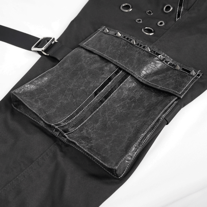 Close-up of Gothic punk jogger pants featuring large front pockets and grommets, showcasing edgy fashion details.