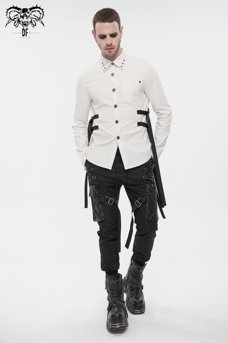 Model wearing a gothic punk outfit with a stylish white shirt and black jogger pants featuring big pockets and grommets.