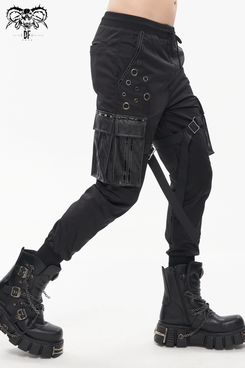 Gothic punk men's jogger pants with big pockets and grommets, paired with chunky black boots.