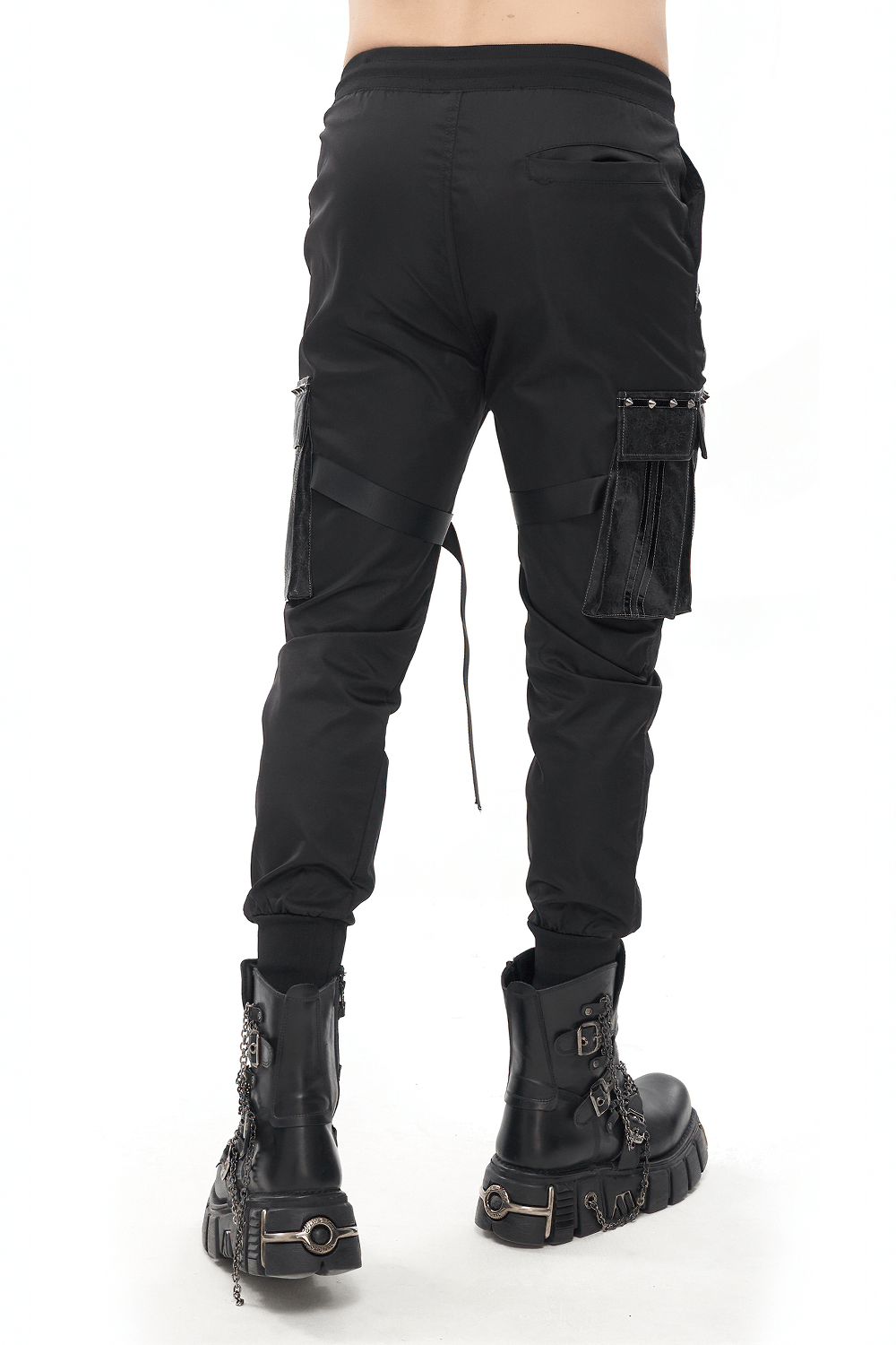 Men's Gothic punk jogger pants with big pockets and elastic waistband, featuring stylish grommet details and black design.