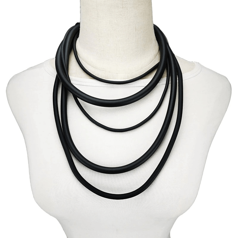 Handmade gothic punk black rubber necklace elegantly displayed on a mannequin, perfect for stylish women's accessories.
