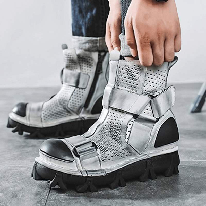 Stylish Gothic punk genuine leather boots with unique design and breathable features on a model's feet.